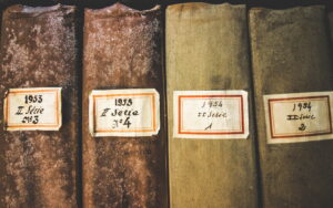 four hardbound books - book archive