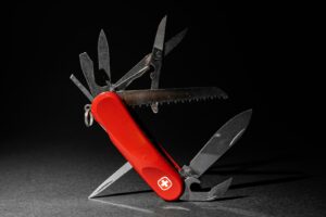 Swiss Army knife, a red and silver multi tool